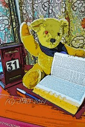 My Teddy Bear struggling to find the meaning of Arctophile in the smaller version of the Oxford English Dictionary