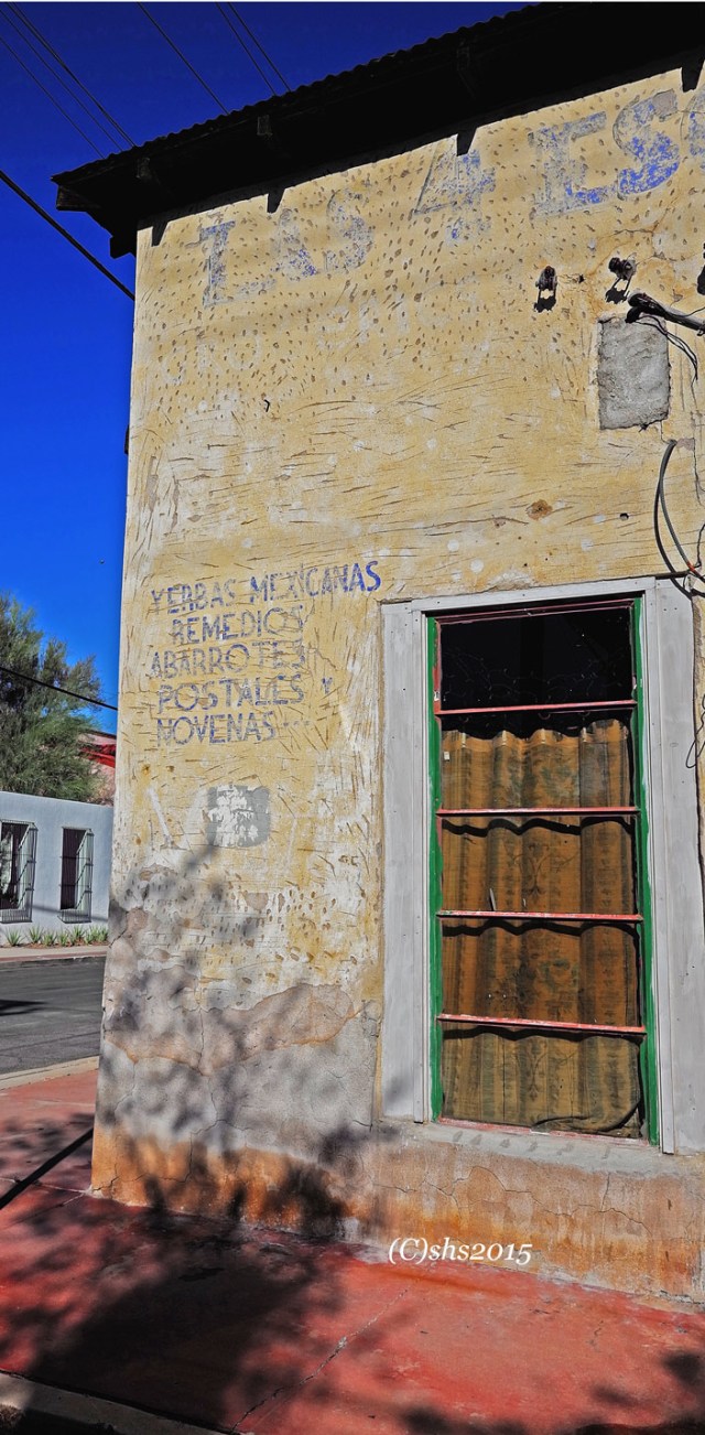 Photograph of a faded sign on a house in tucson arizona by susan sheldon nolen