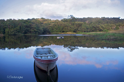 susan nolen's photograph of a boat on the lake on Rancho Primavera